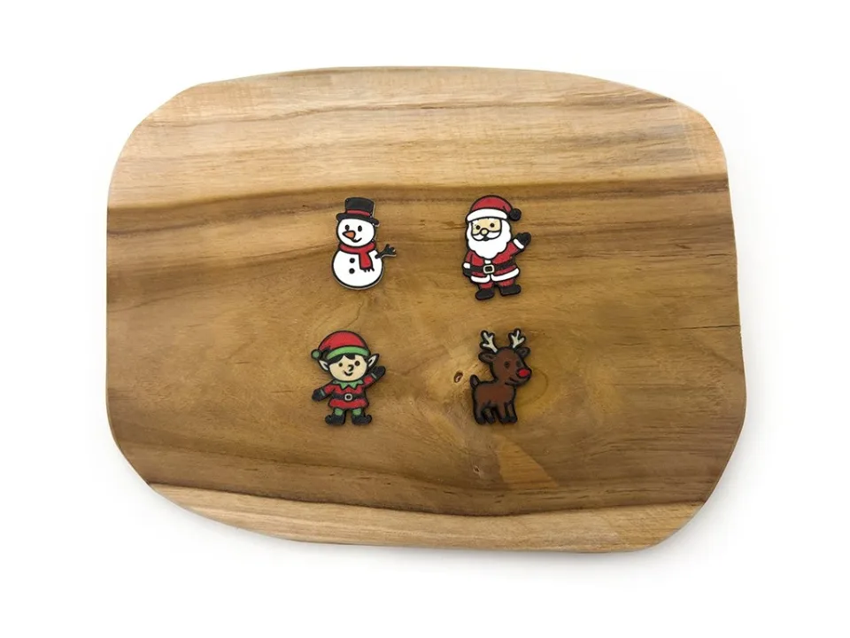 Miniatury Santa a pomocníci